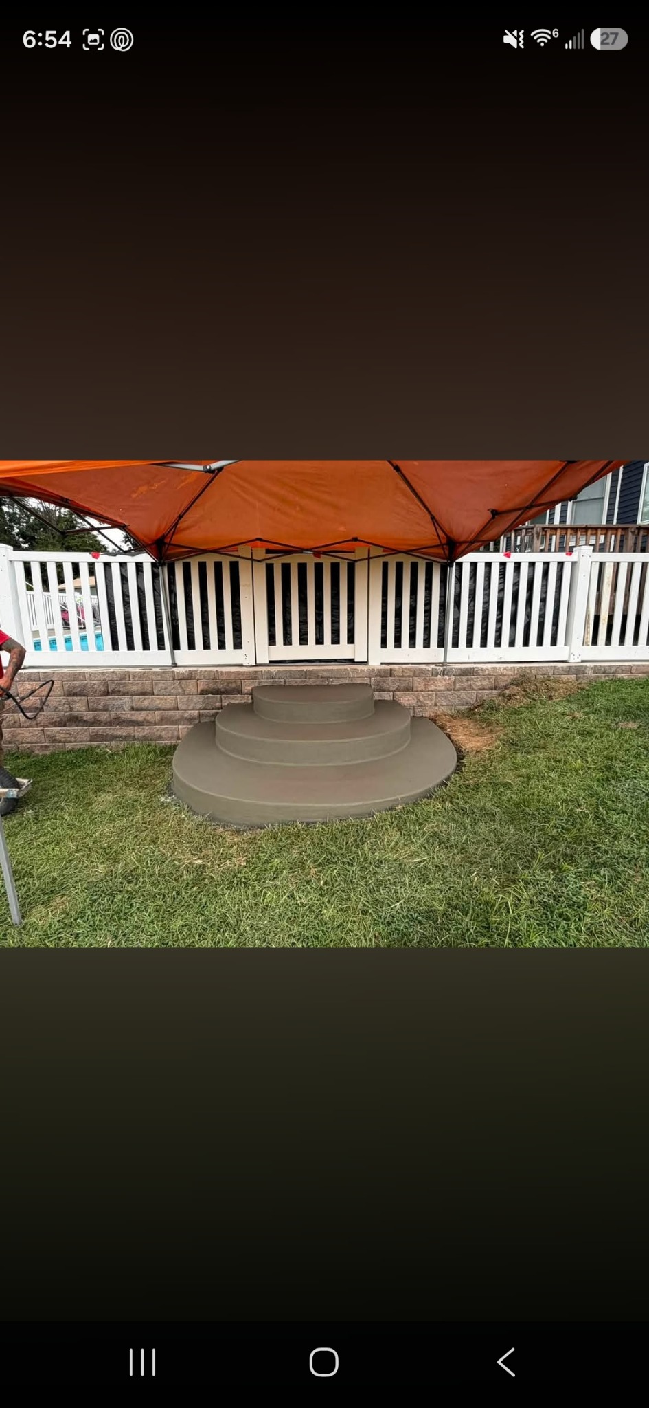 Rounded concrete pool steps