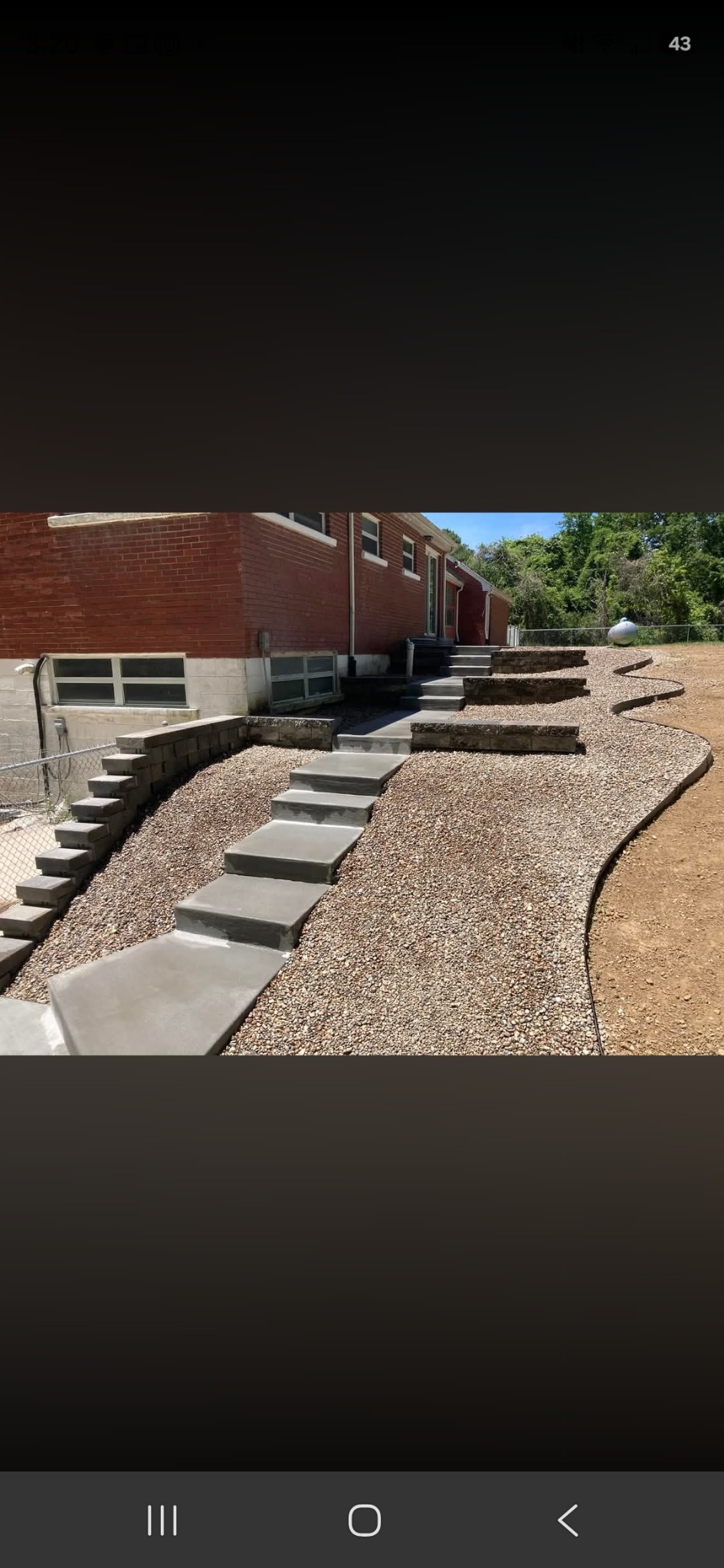 Tiered retaining wall and concrete steps project