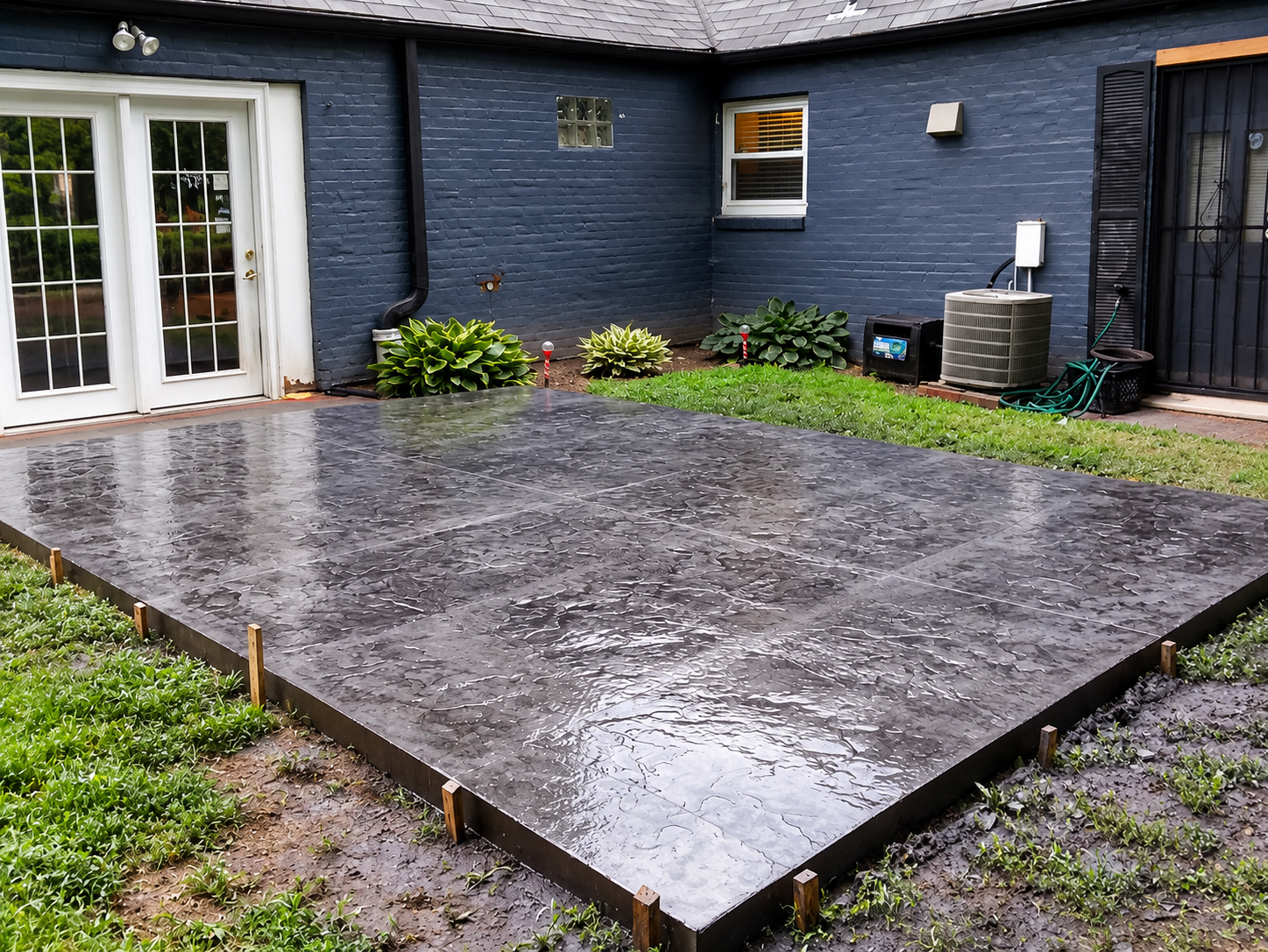 Dark gray stamped concrete patio